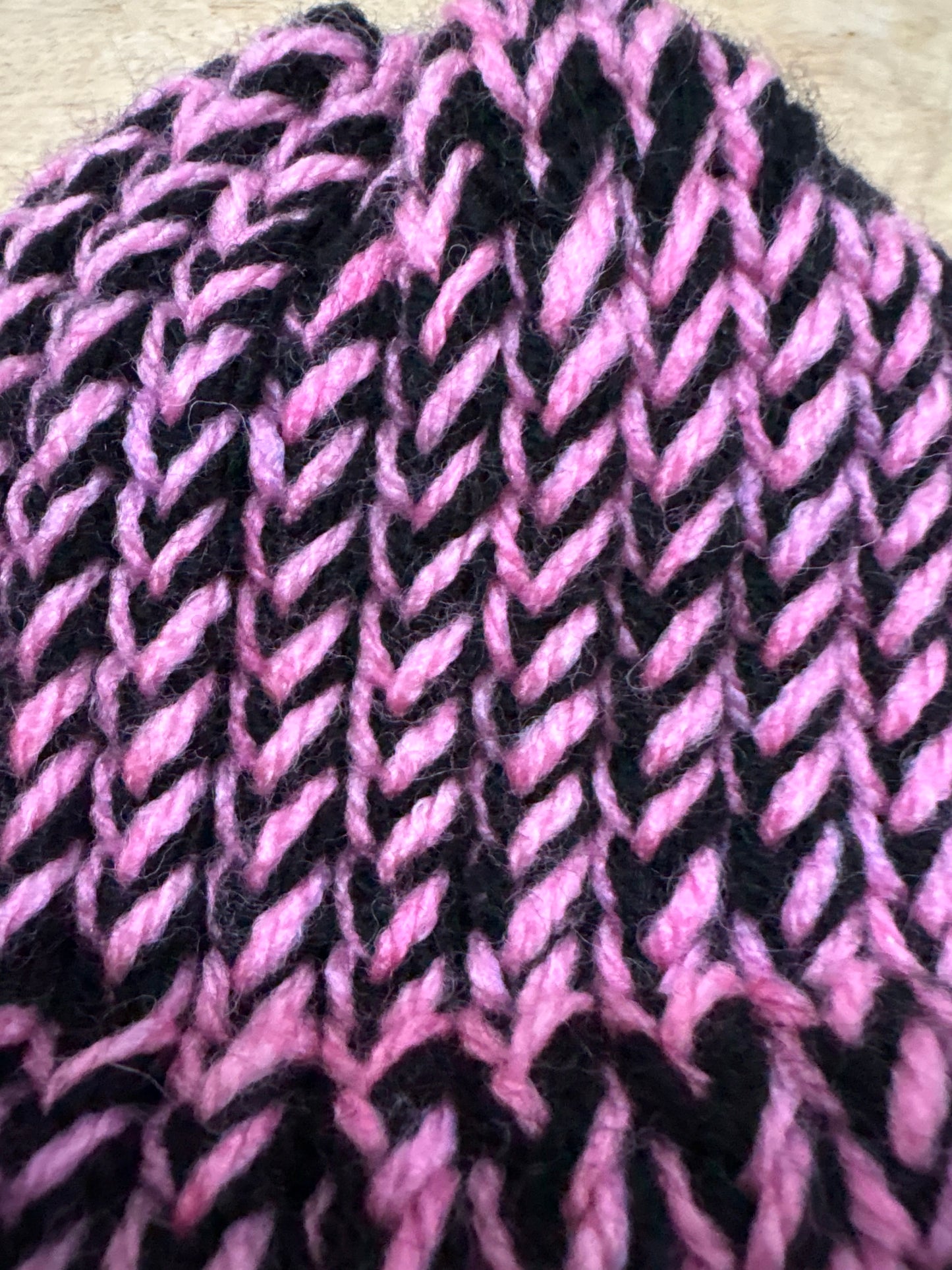 Pink and black bay hat