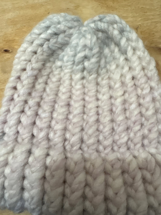 Muted pink and blue fuzzy baby hat