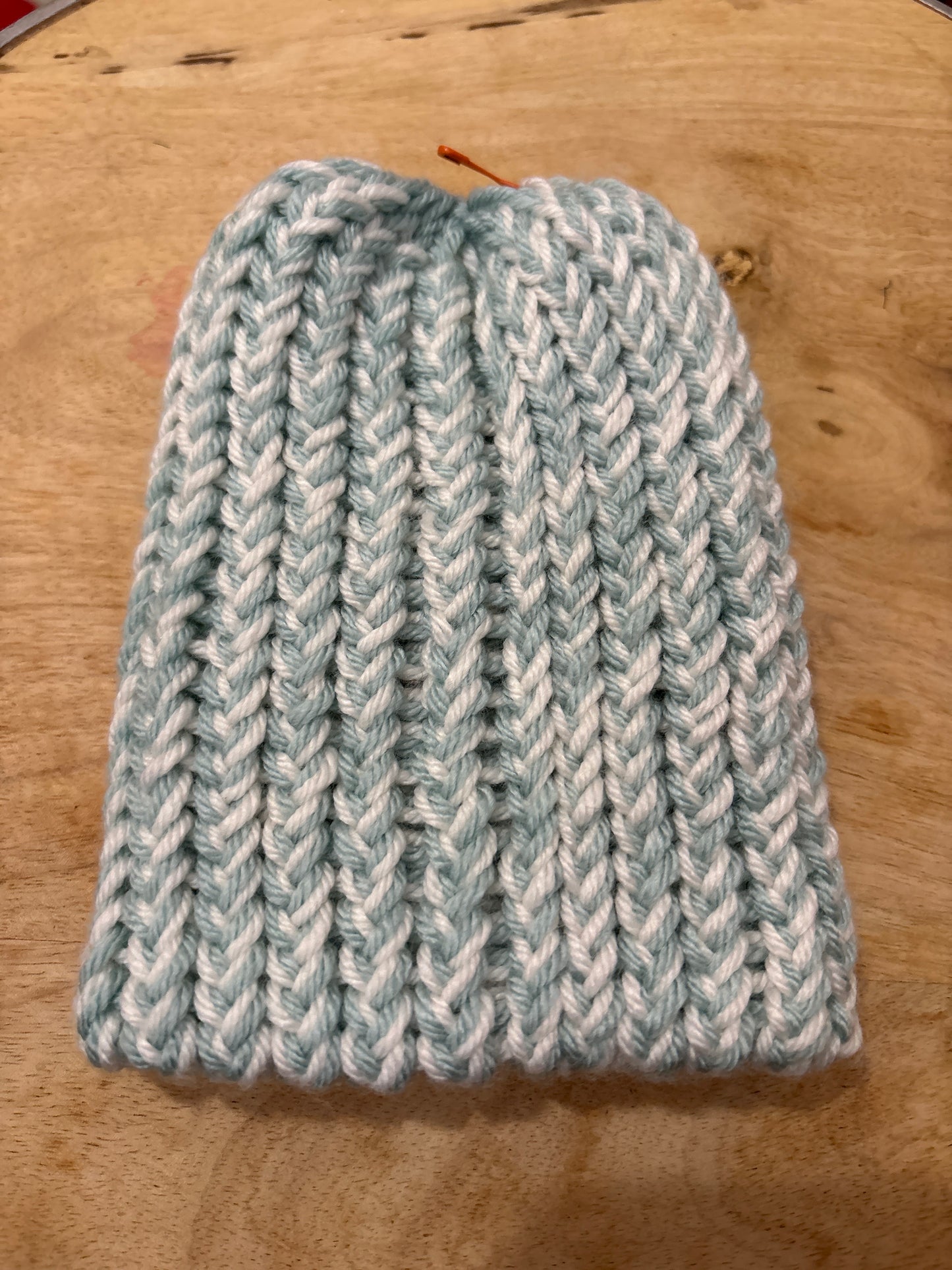 Light blue and yellow baby hat